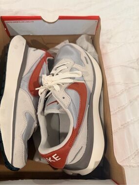 Nike woman’s gray and Red Retro-Style Running Sneakers